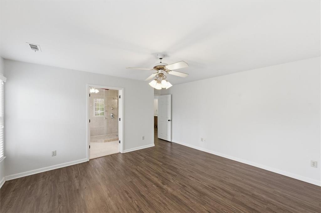 139 Stanbrough Drive Dallas, GA 30157 - Photo 36 of 52 wooden floor in an empty room with a window