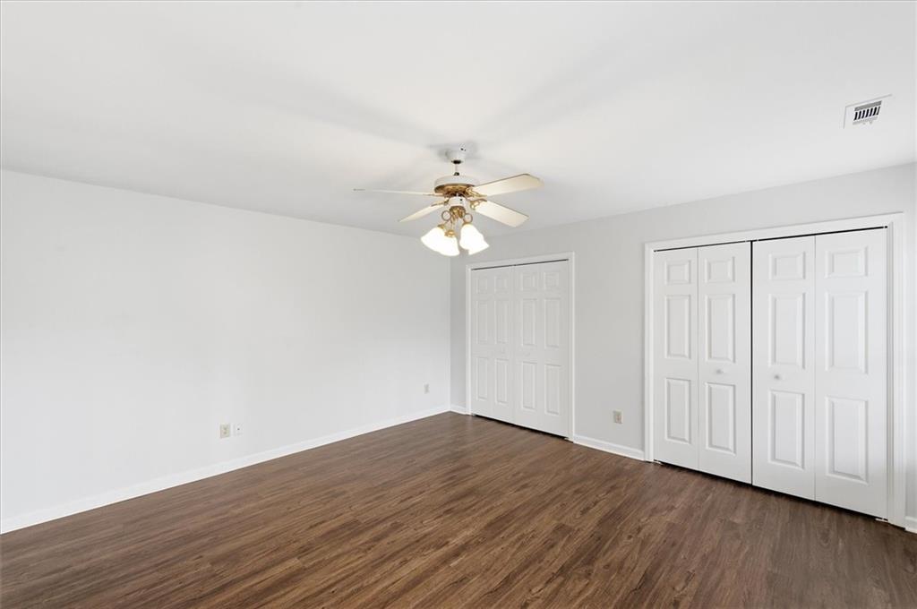 139 Stanbrough Drive Dallas, GA 30157 - Photo 37 of 52 wooden floor in an empty room with a window