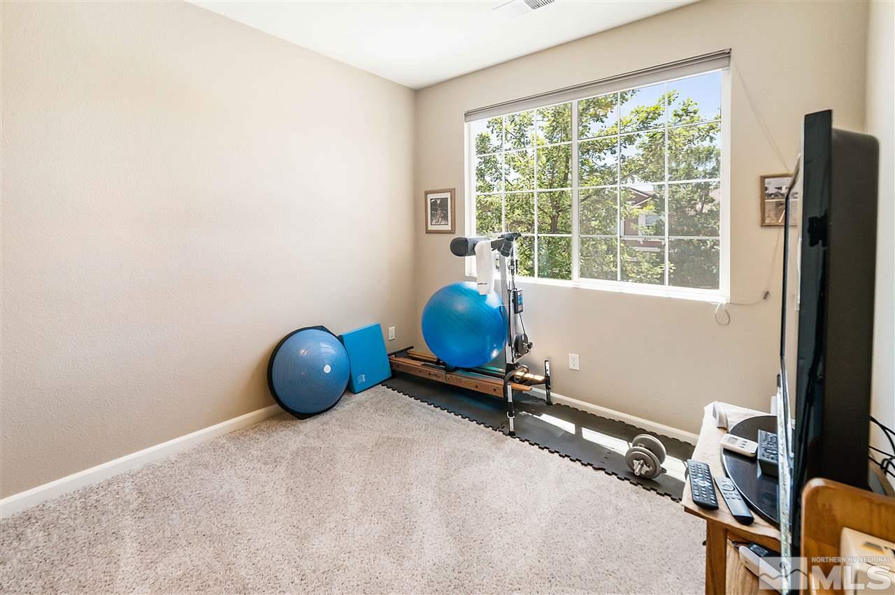 1875 Stetson Drive Reno, NV 89521 - Photo 21 of 27 a room with furniture and a window