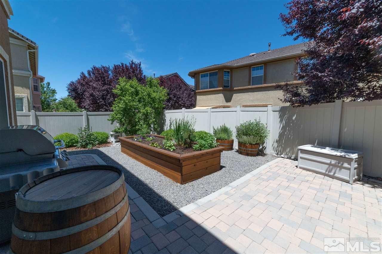 1875 Stetson Drive Reno, NV 89521 - Photo 26 of 27 a view of outdoor sitting area with furniture and wooden fence