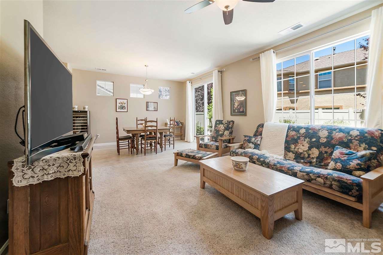 1875 Stetson Drive Reno, NV 89521 - Photo 7 of 27 a living room with furniture and a flat screen tv