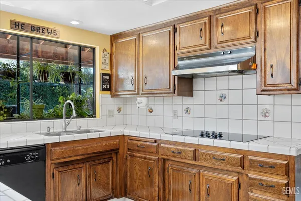 a bedroom with a bed and ceiling fan