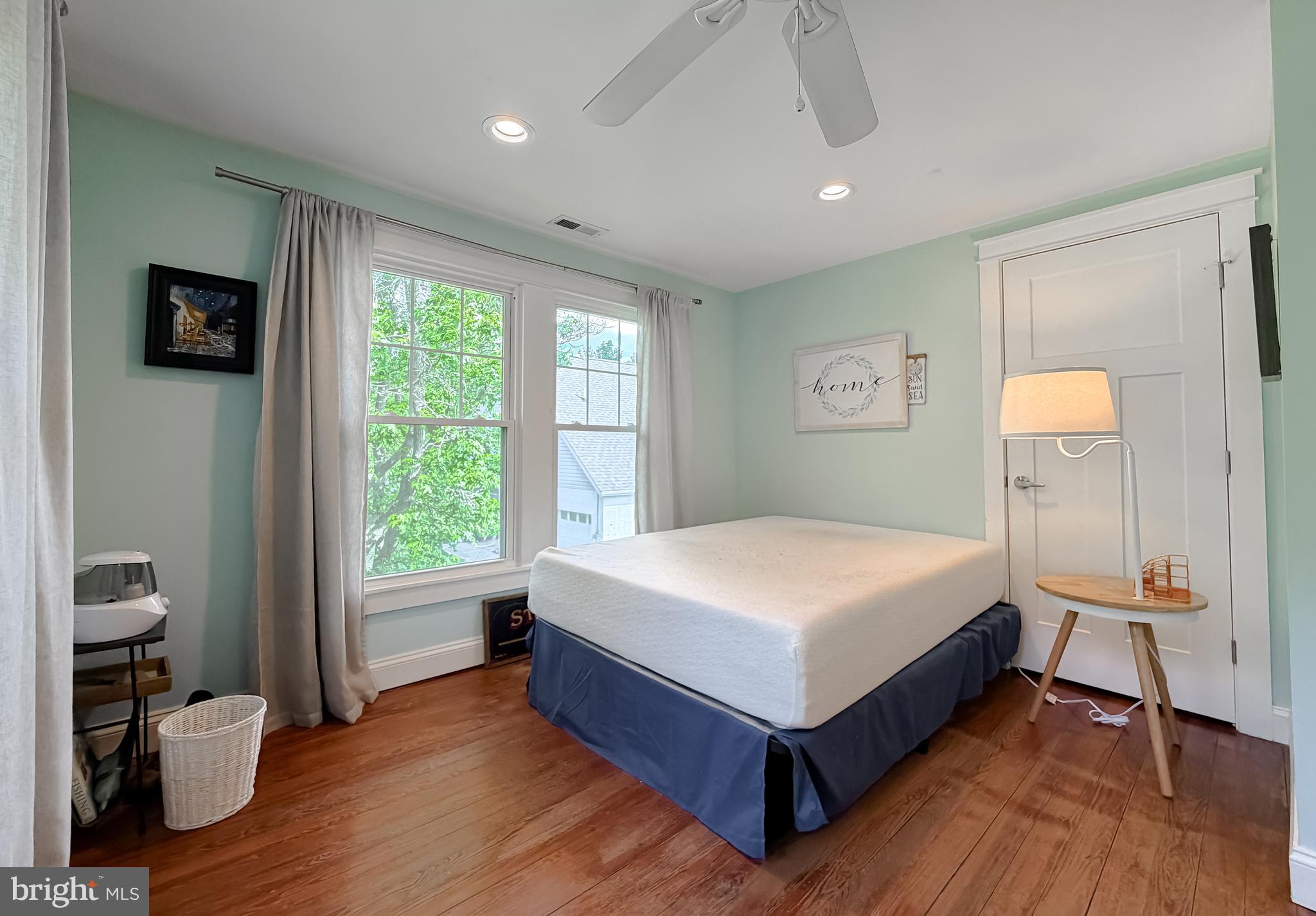 16146 Thomas Road Piney Point, MD 20674 - Photo 25 of 57 a bedroom with a bed and a window
