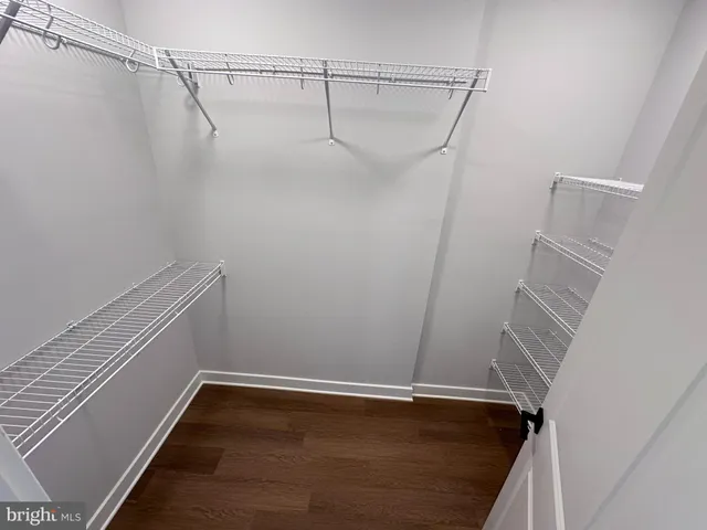 a view of a room with racks on the wall