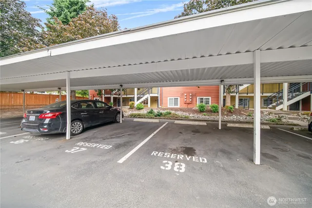 a view of a garage with cars