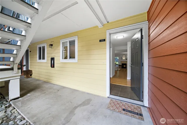 a view of a brick house with a sink and a window
