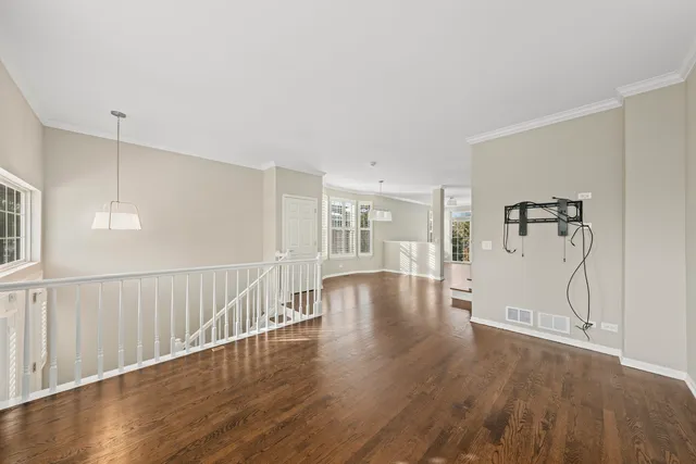 a view of a livingroom with wooden floor