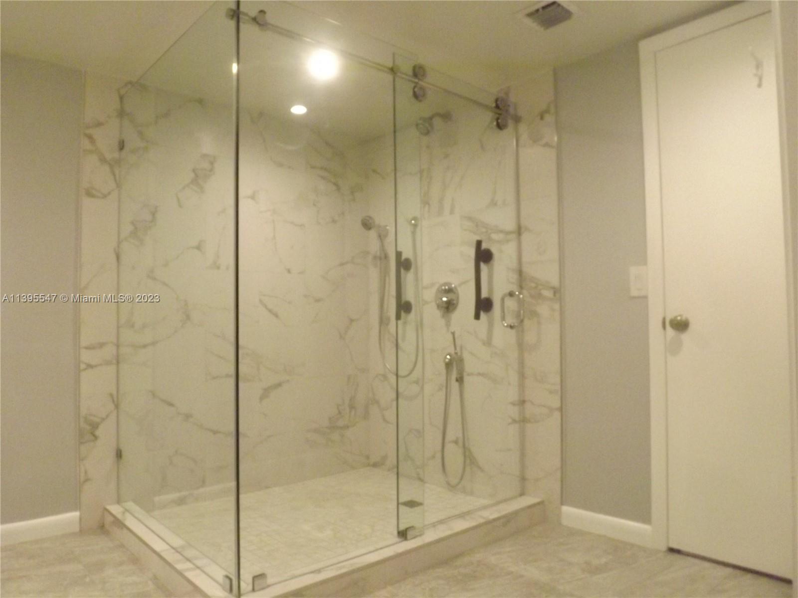 Kendall Miami, FL 33173 - Photo 14 of 34 a bathroom with a shower