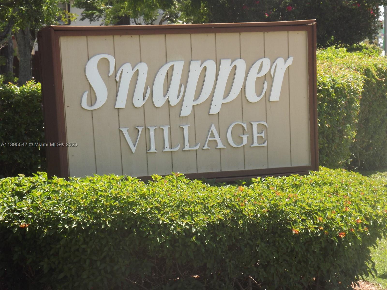 Kendall Miami, FL 33173 - Photo 22 of 34 a sign that is on a wooden wall