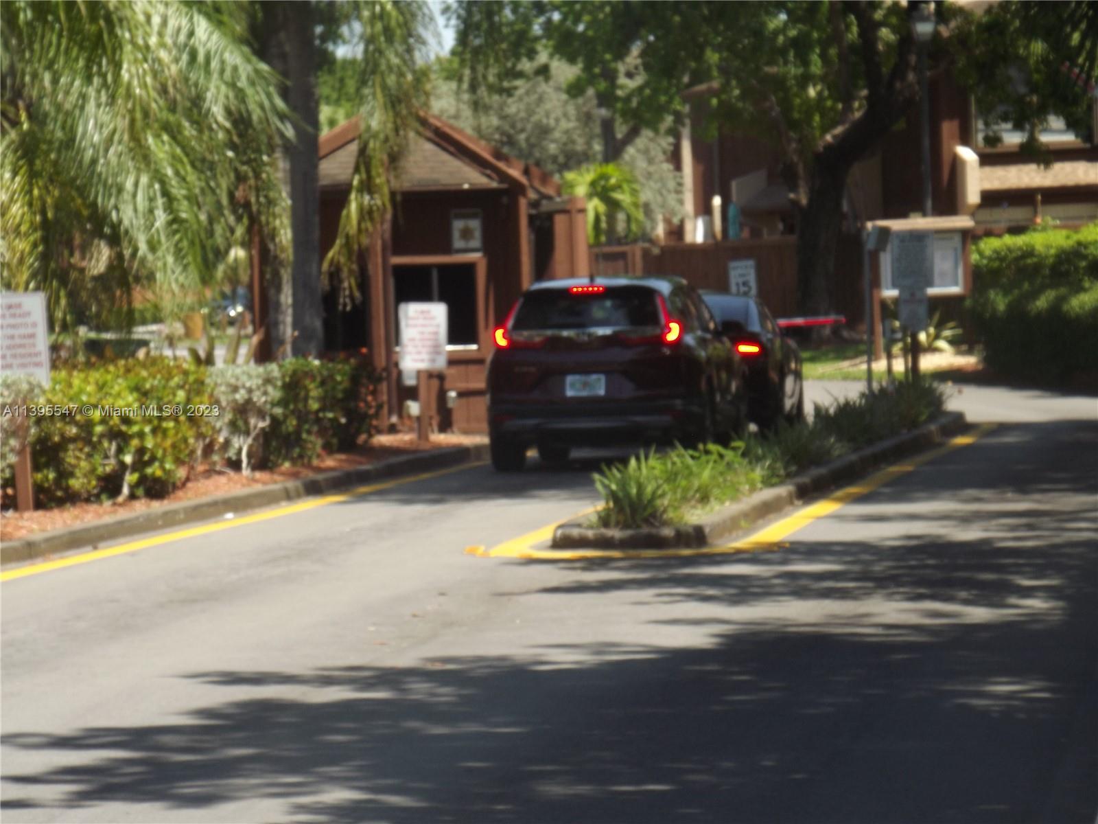 Kendall Miami, FL 33173 - Photo 23 of 34 a front view of a house with a garden