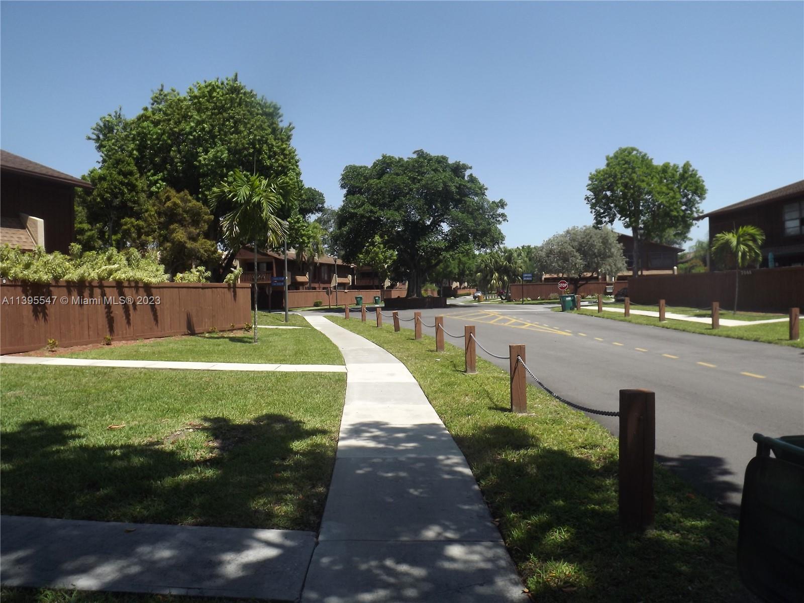 Kendall Miami, FL 33173 - Photo 24 of 34 a view of a swimming pool with a garden