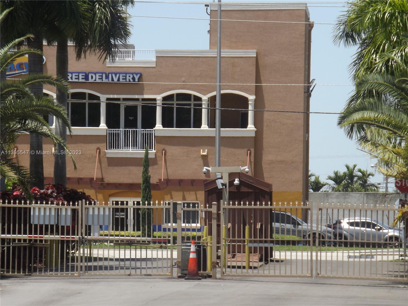 Kendall Miami, FL 33173 - Photo 32 of 34 a front view of multi story residential apartment building with glass door and stairs