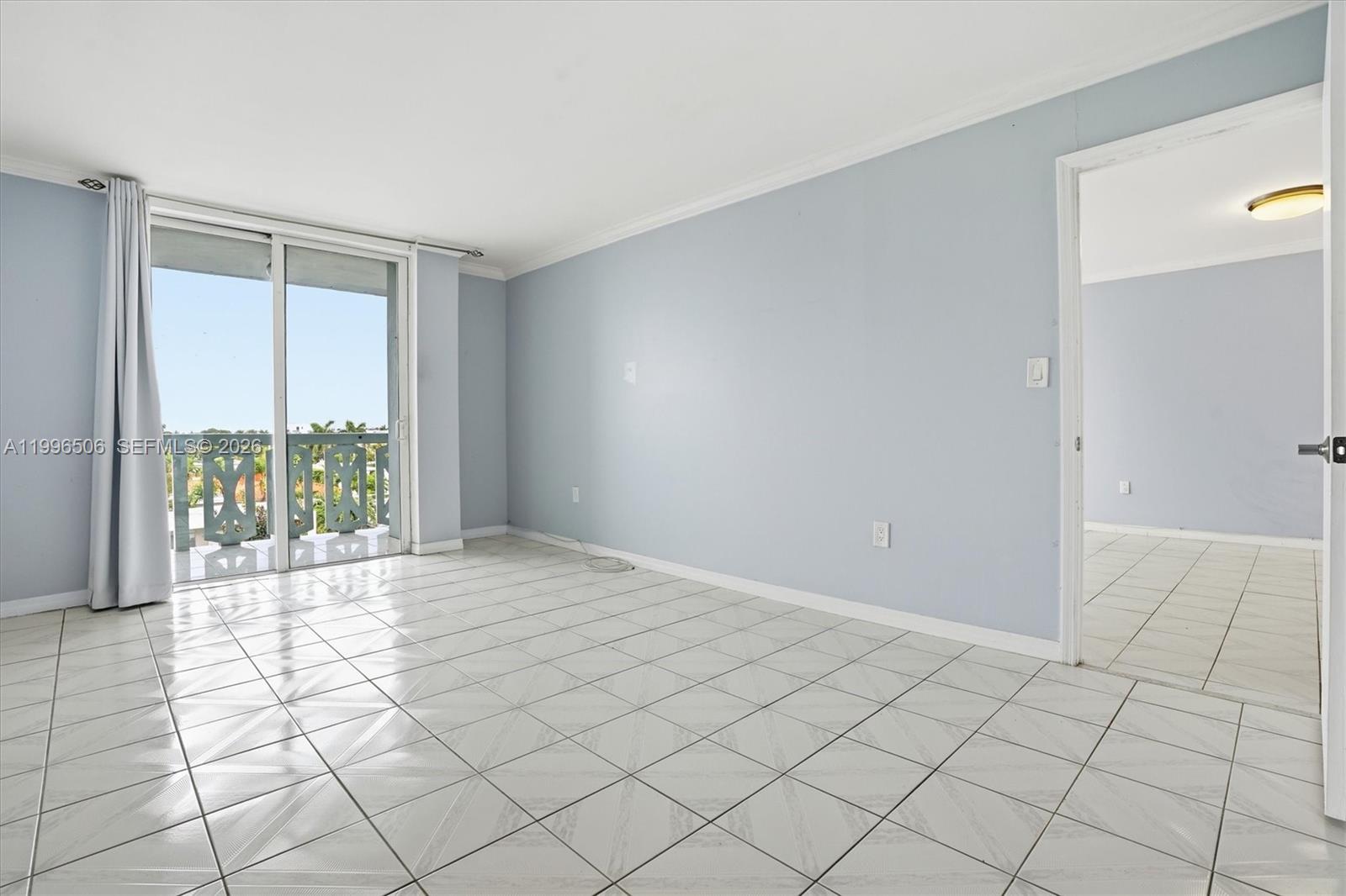 8233 Harding Avenue, Unit 504 Miami Beach, FL 33141 - Photo 13 of 24 a view of an empty room and window