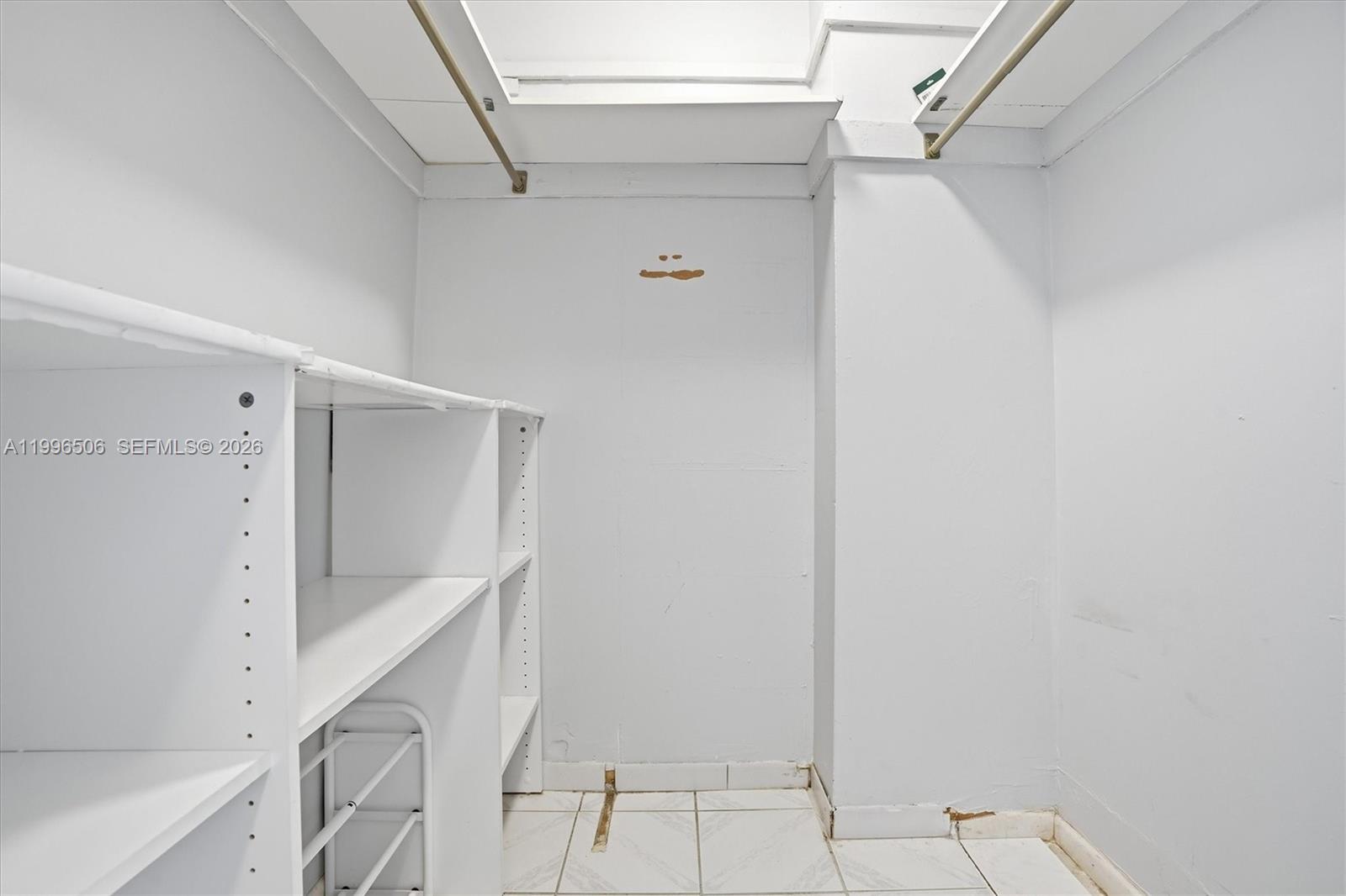 8233 Harding Avenue, Unit 504 Miami Beach, FL 33141 - Photo 17 of 24 a view of walk in closet