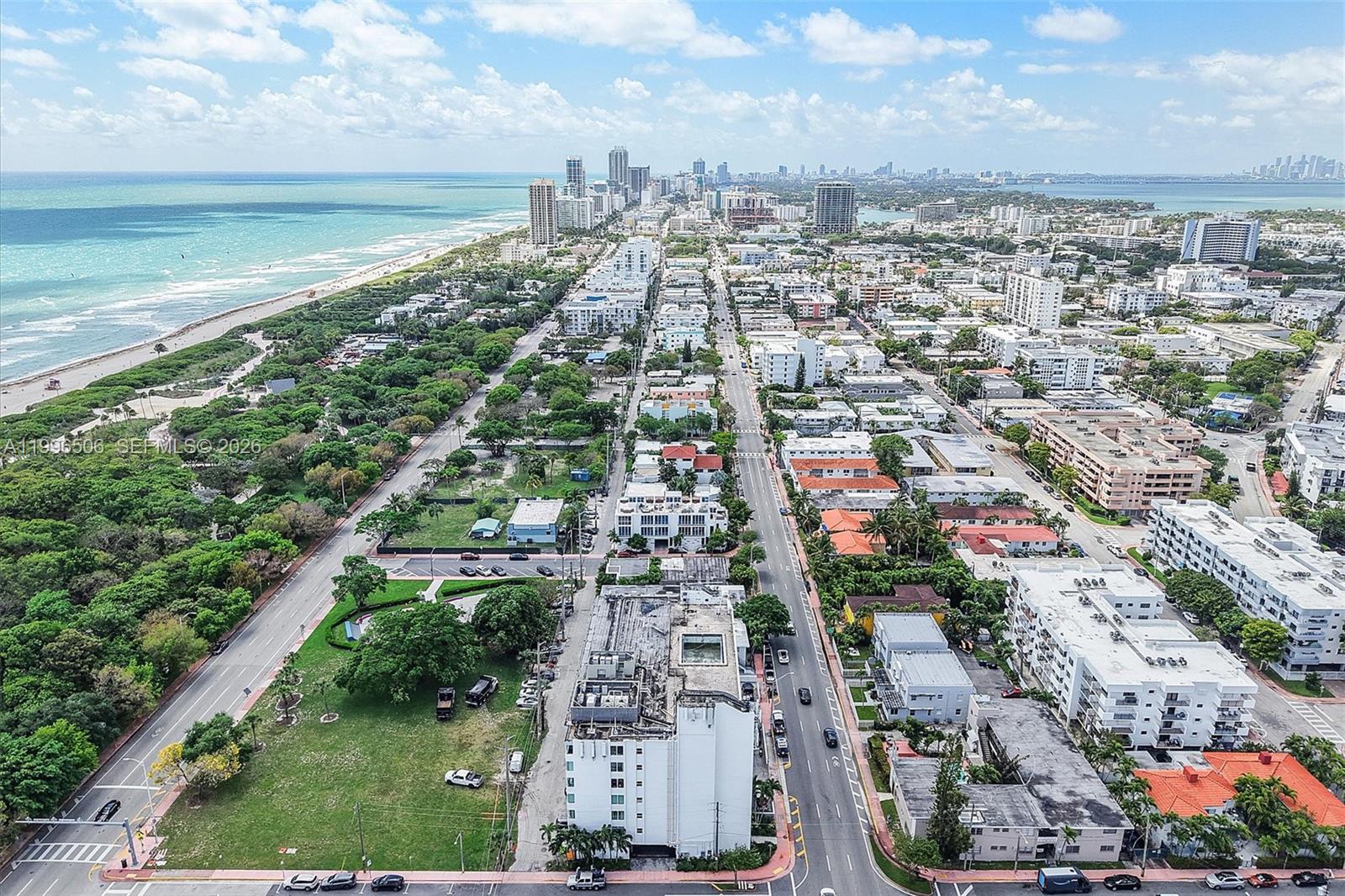 8233 Harding Avenue, Unit 504 Miami Beach, FL 33141 - Photo 22 of 24 an aerial view of residential building and lake