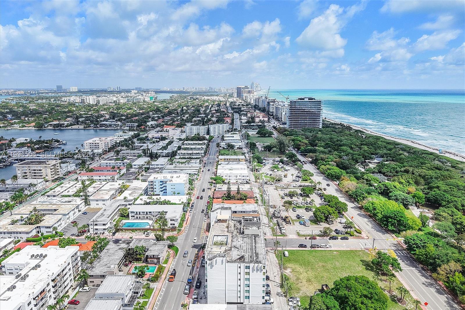 8233 Harding Avenue, Unit 504 Miami Beach, FL 33141 - Photo 23 of 24 an aerial view of residential building with green space