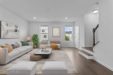 a living room with furniture and window