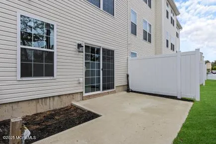 a view of a house with a door and a window