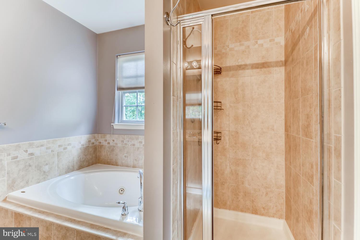 11513 Lipscomb Way White Marsh, MD 21162 - Photo 20 of 36 Separate tile-walled shower w/ built-in shelves