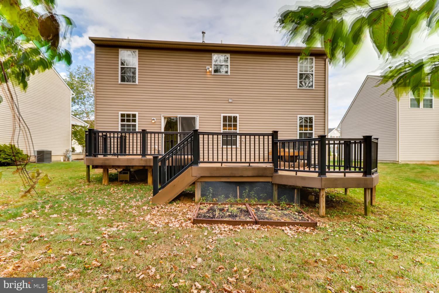 11513 Lipscomb Way White Marsh, MD 21162 - Photo 30 of 36 Deck has walkdown steps to the flat backyard.
