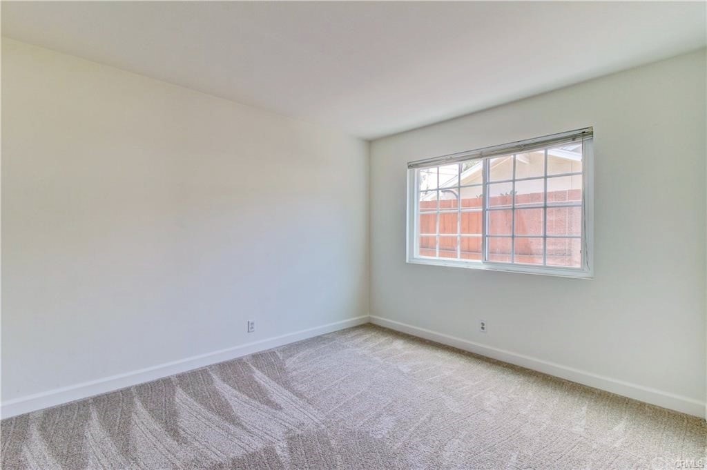 2814 Serang Place Costa Mesa, CA 92626 - Photo 19 of 28 an empty room with a window