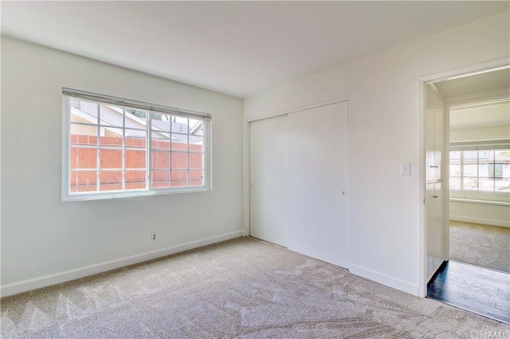 2814 Serang Place Costa Mesa, CA 92626 - Photo 20 of 28 an empty room with windows