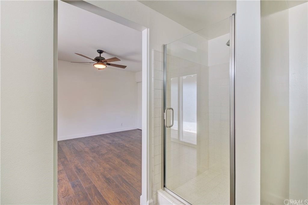 2814 Serang Place Costa Mesa, CA 92626 - Photo 22 of 28 a view of a hallway with a glass door
