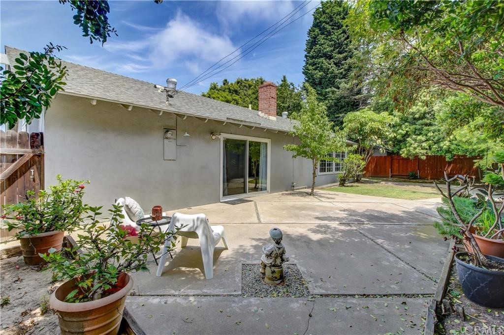 2814 Serang Place Costa Mesa, CA 92626 - Photo 27 of 28 a front view of a house with a yard