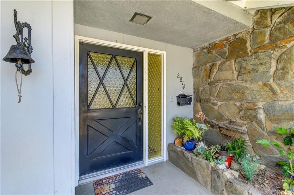 2814 Serang Place Costa Mesa, CA 92626 - Photo 4 of 28 a view of a entryway door of the house