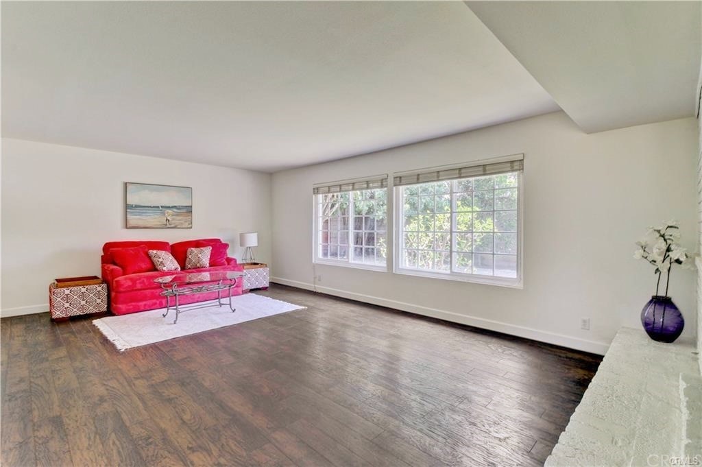 2814 Serang Place Costa Mesa, CA 92626 - Photo 7 of 28 a living room with furniture window and wooden floor