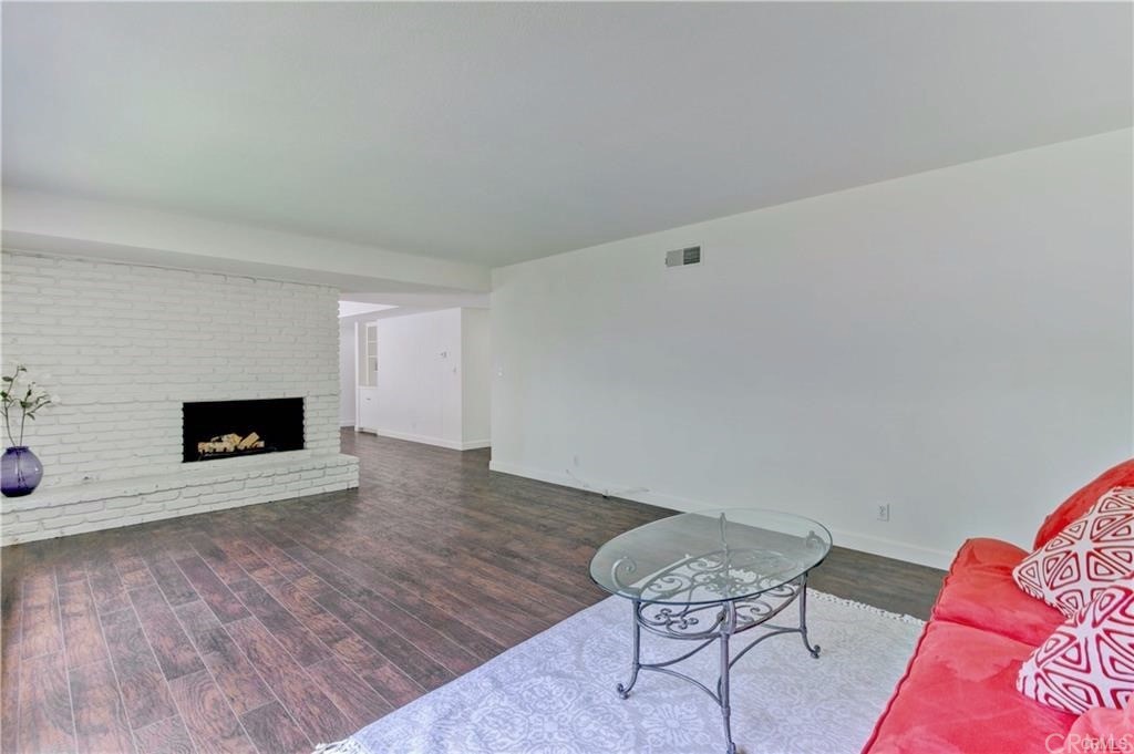 2814 Serang Place Costa Mesa, CA 92626 - Photo 8 of 28 a view of livingroom with furniture and wooden floor