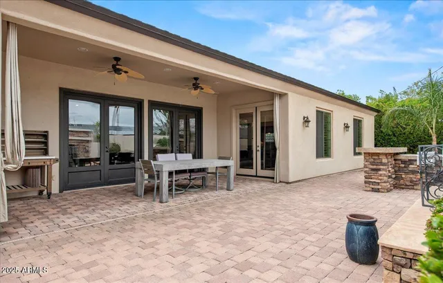 a bathroom with a tub sink and a mirror