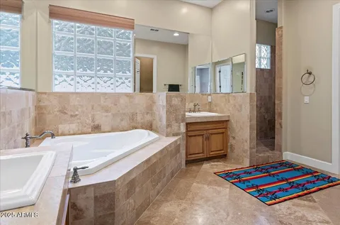 a bedroom with a bed and furniture