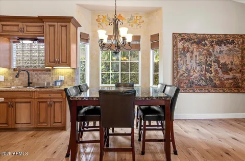 a front view of a building with potted plants