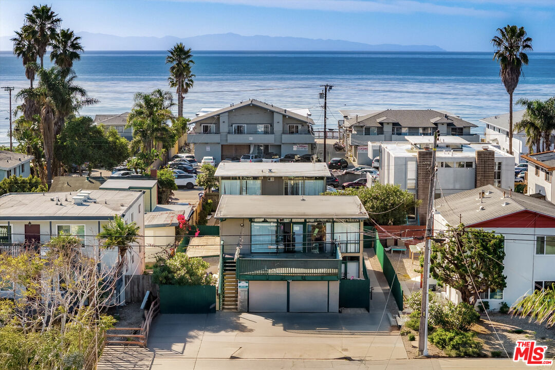 a view of multiple houses with a outdoor space