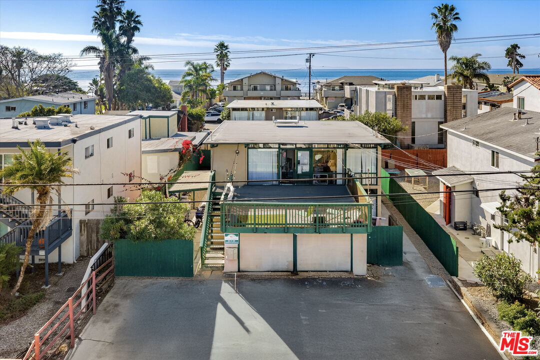 6615 Sabado Tarde Road Goleta, CA 93117 - Photo 3 of 13 a view of a house with a ocean view