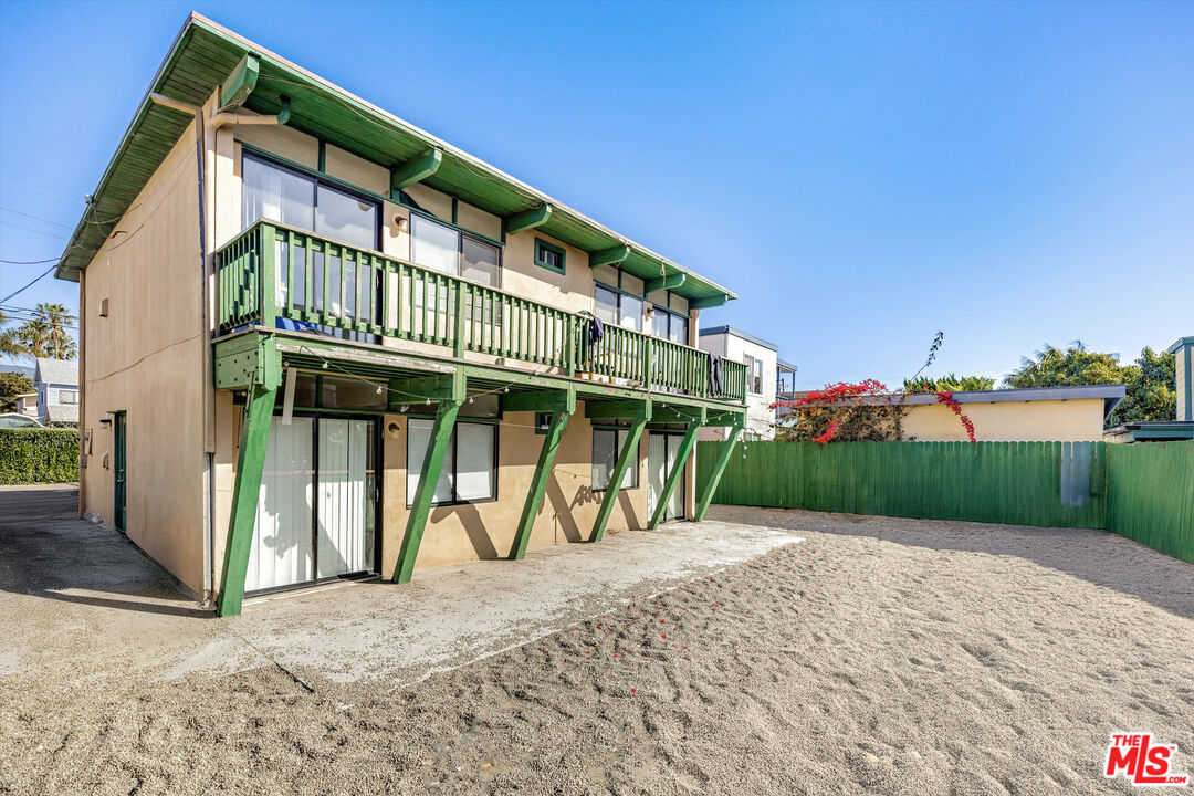 6615 Sabado Tarde Road Goleta, CA 93117 - Photo 8 of 13 a view of a house with a yard