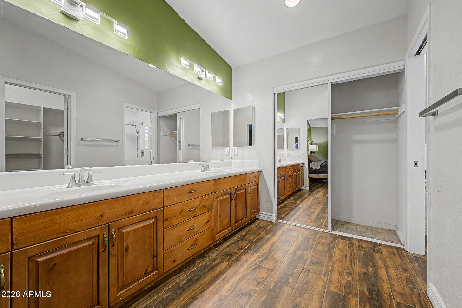 802 East Roberts Road Phoenix, AZ 85022 - Photo 11 of 24 a large bathroom with a sink and a large mirror