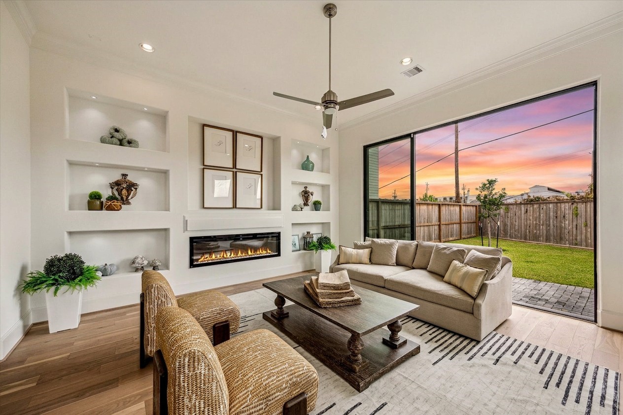 1008 Golden Nectar Houston, TX 77008 - Photo 1 of 10 stunning living room with builtin shelves and 12 ft ceilings and large backyard