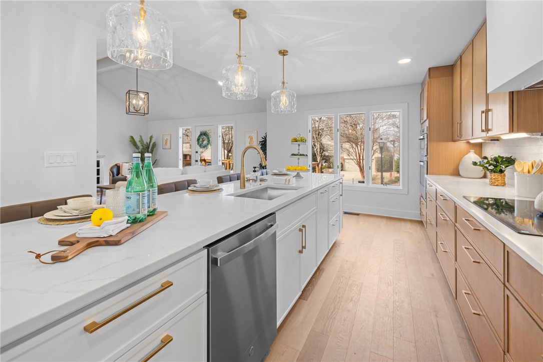 117 Riverpoint Drive Clemson, SC 29631 - Photo 20 of 47 This kitchen showcases a clean, contemporary design with light finishes and natural light.