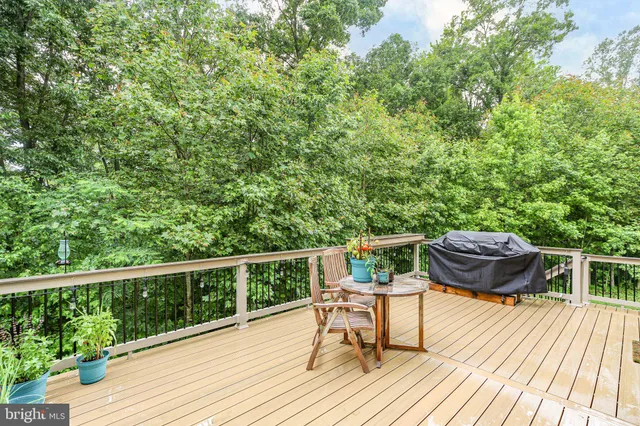 a view of a chairs and table on the wooden floor