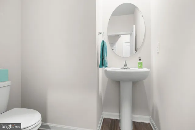 a view of a bathroom from the hallway