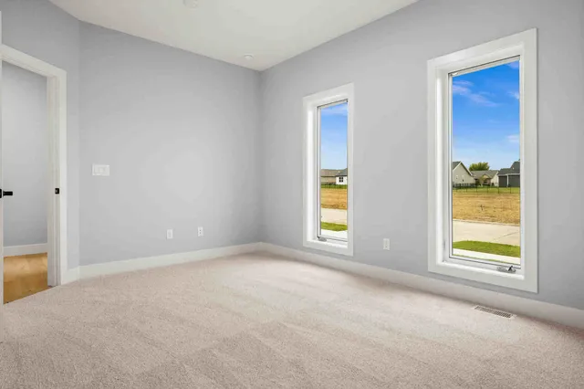 an empty room with windows
