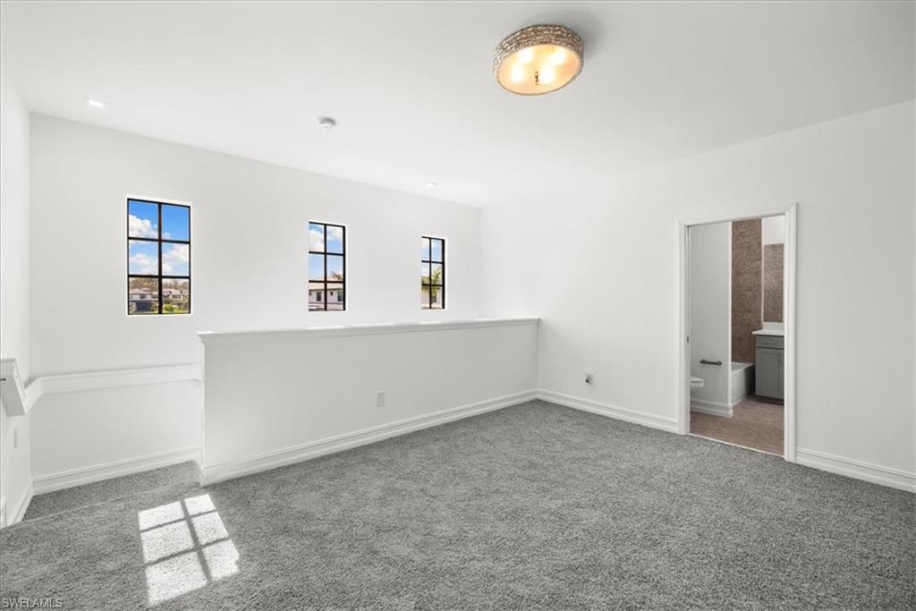 7622 Rockefeller Drive Naples, FL 34119 - Photo 14 of 40 a view of empty room with window
