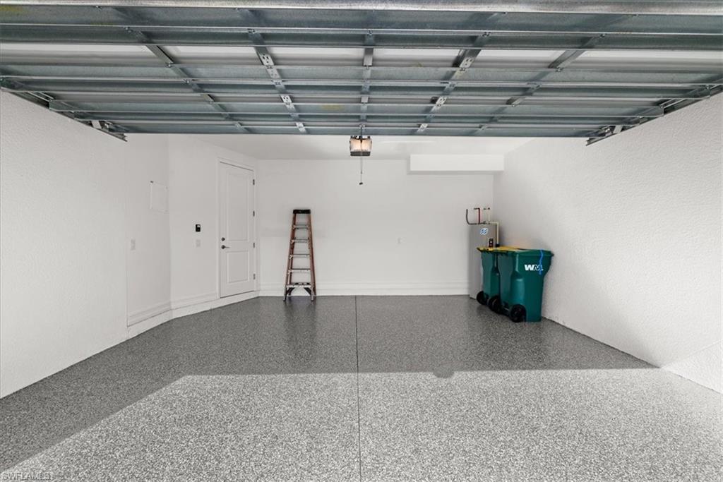 7622 Rockefeller Drive Naples, FL 34119 - Photo 31 of 40 a view of a garage