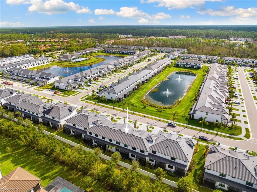 7622 Rockefeller Drive Naples, FL 34119 - Photo 32 of 40 an aerial view of residential houses with outdoor space