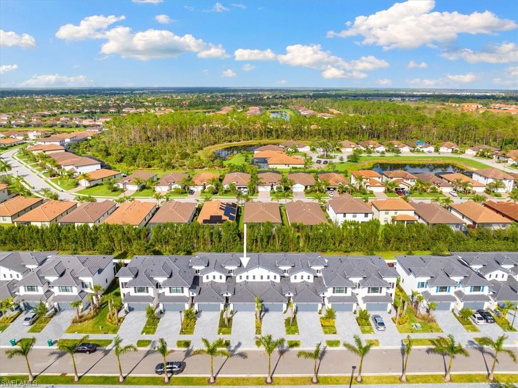 7622 Rockefeller Drive Naples, FL 34119 - Photo 33 of 40 a view of a city with a ocean view
