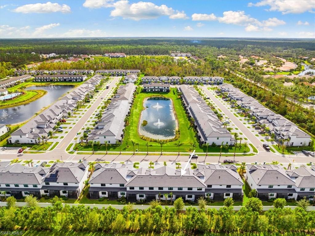 7622 Rockefeller Drive Naples, FL 34119 - Photo 35 of 40 an aerial view of residential houses with outdoor space and swimming pool