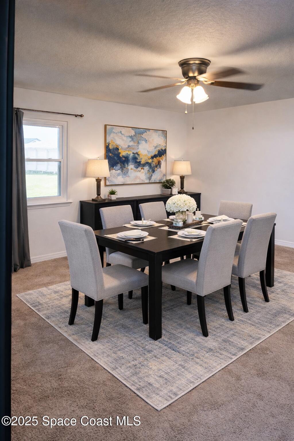 645 Chicago Way Dundee, FL 33838 - Photo 13 of 25 a dining room with furniture and window