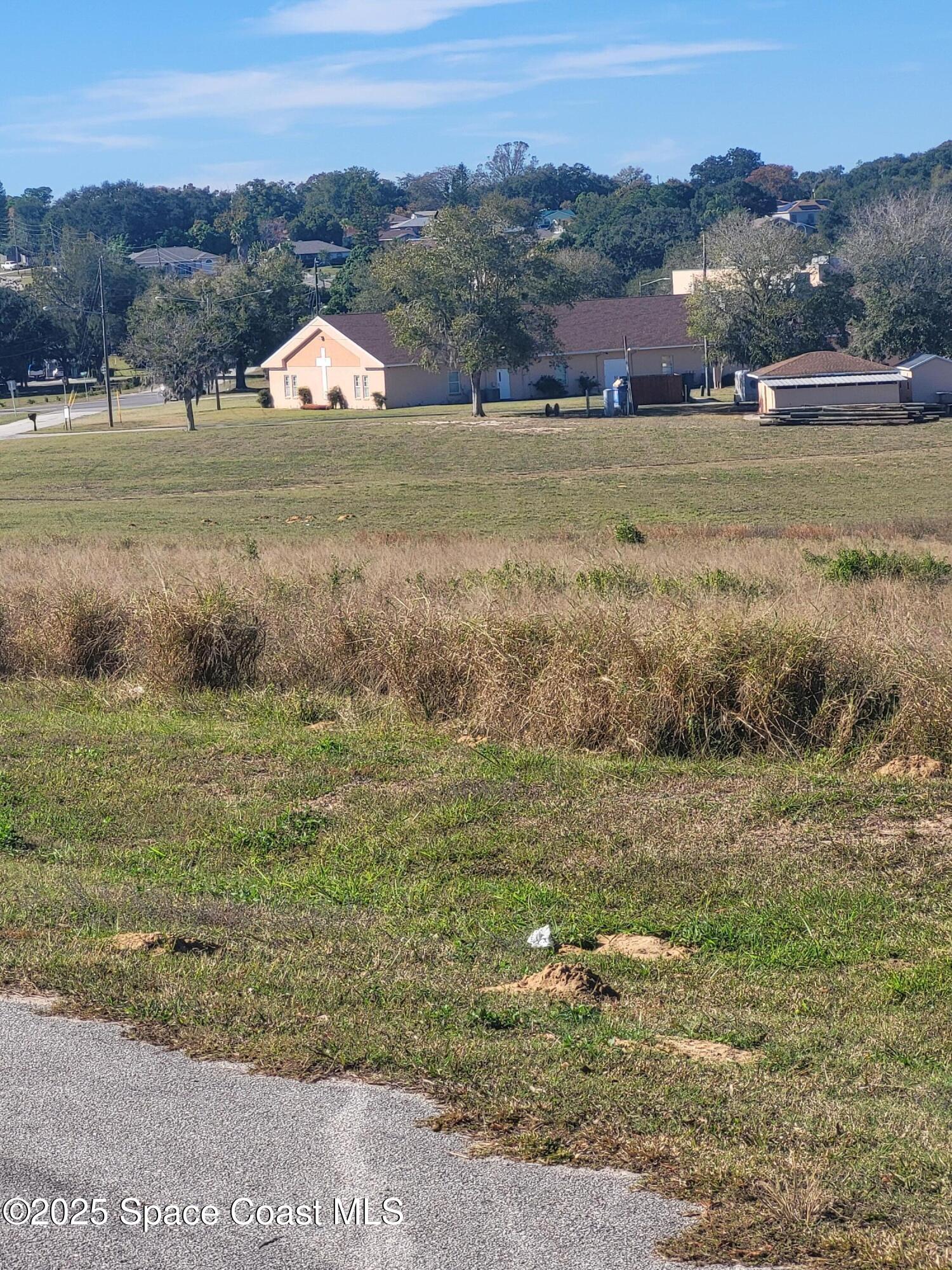645 Chicago Way Dundee, FL 33838 - Photo 24 of 25 a view of an outdoor space and mountain view